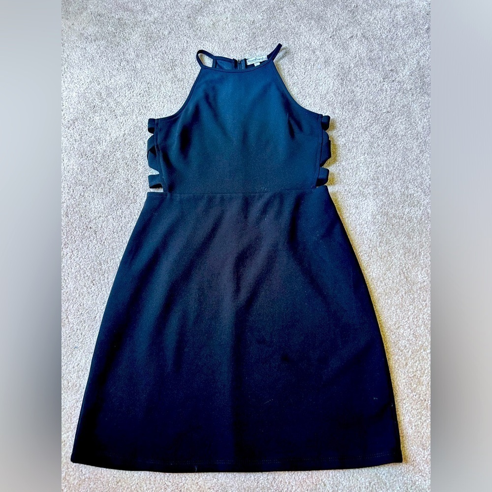 Extraordinary Black Dress size Medium Side Cut Outs